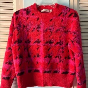 Very soft multi color sweater with subtle glitter throughout. Worn once.